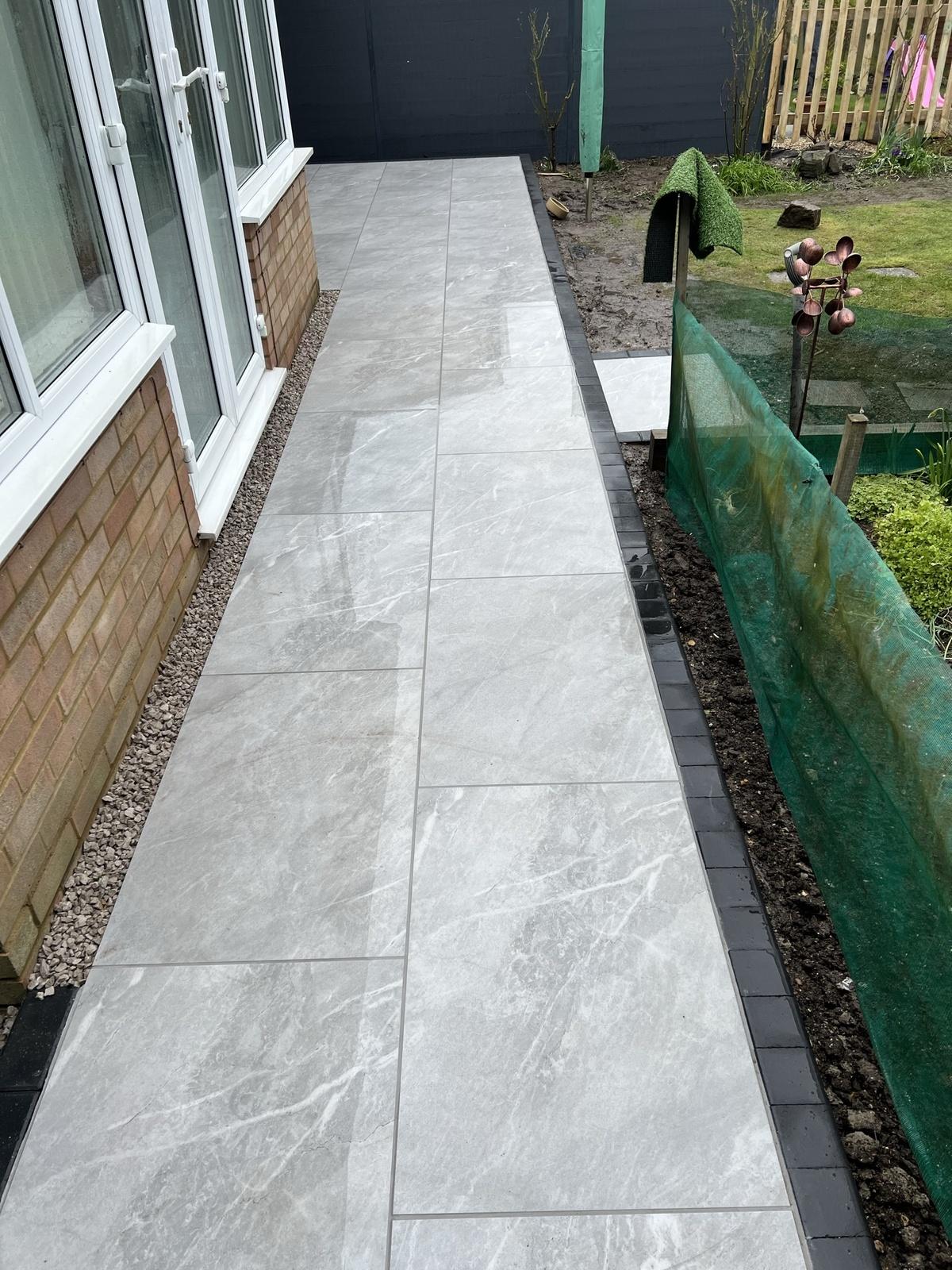 Patio with Kerb Edgings - Porcelain patio installation in Woburn Green