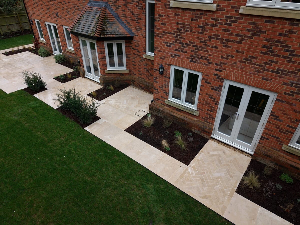 Egyptian Limestone Patio with Herringbone Pattern - Full Landscaping in Beaconsfield, HP9