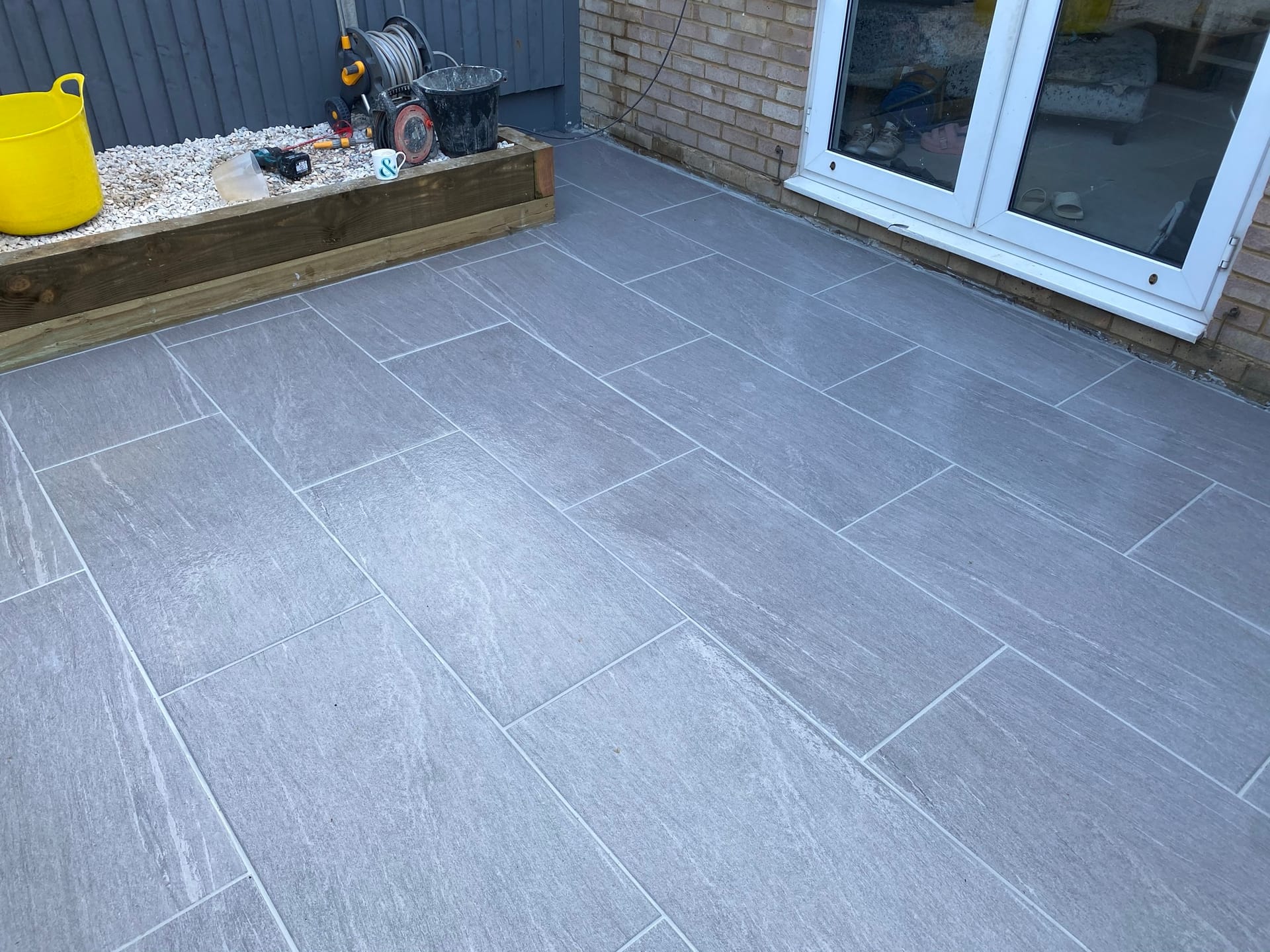 Porcelain Patio with Sleeper Retaining Wall - view 3